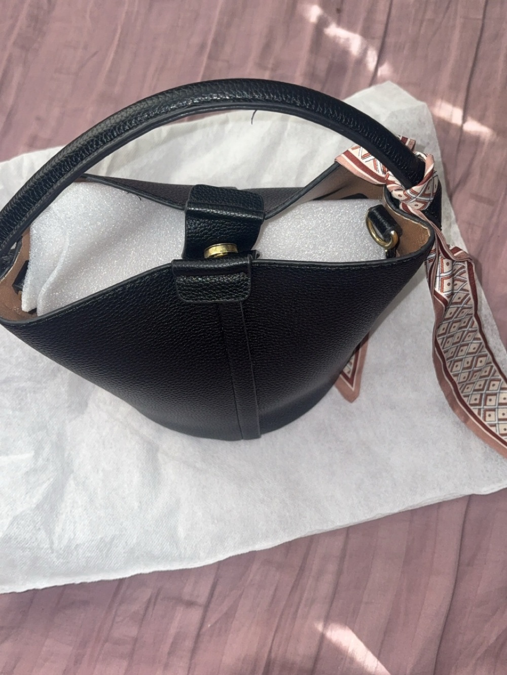 Classic Black Leather Bucket Bag with Scarf Accent